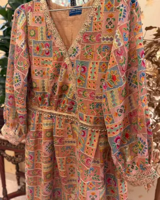 This beautiful single Kurti with colorful embroidery