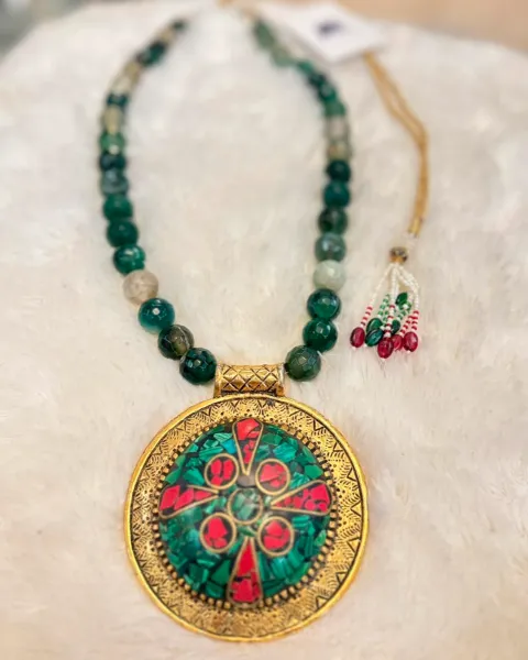 Handcrafted Green Beaded Necklace with Ornate Pendant 